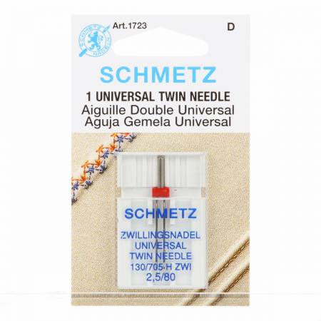 Packaging of SCHMETZ twin machine needle, displaying the needle, brand name, and other details.