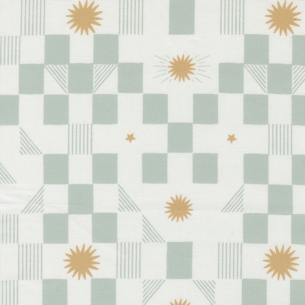 fabric swatch with soft sage green and white checkerboard patterns with various gold starbursts and fine sage green lines