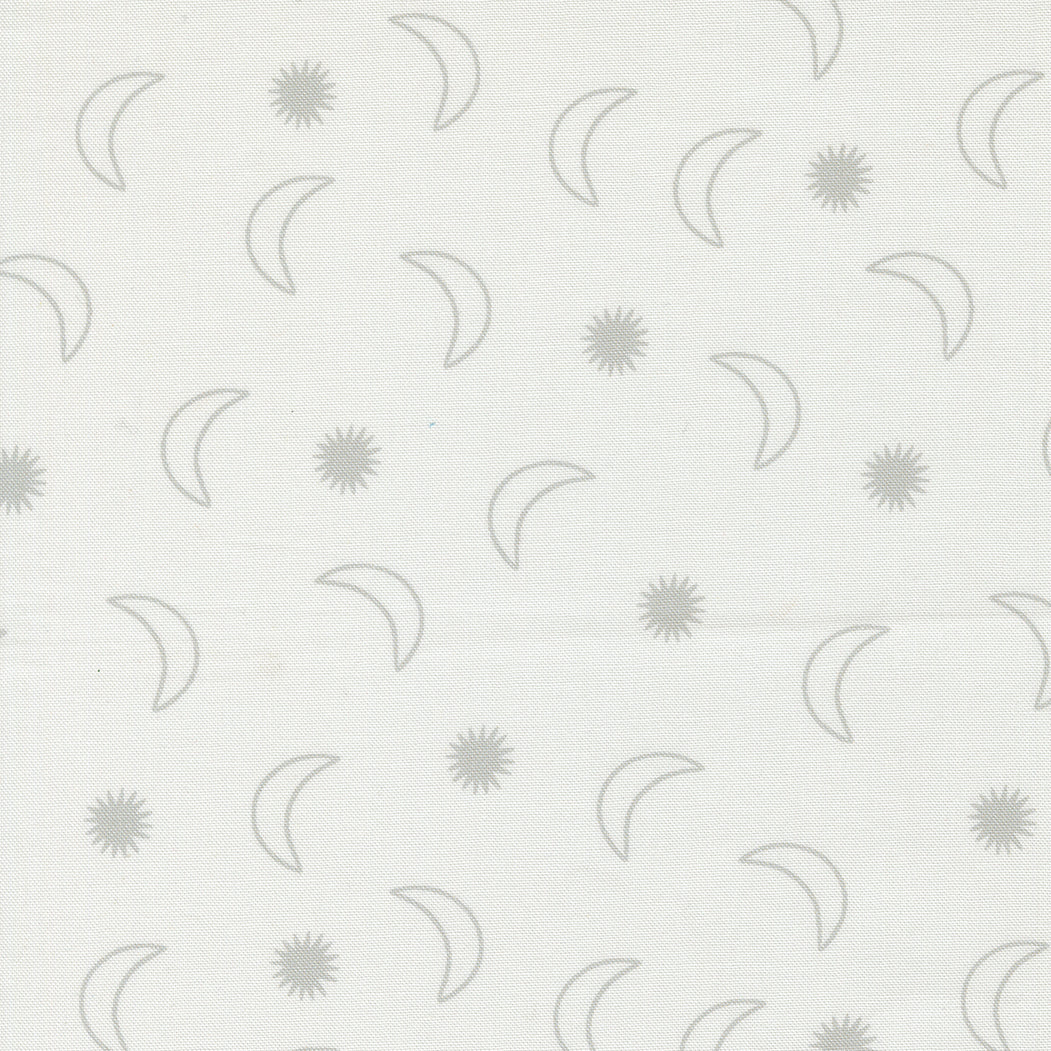 fabric switch with starbursts and crescent moon outlines in soft gray on a soft white background