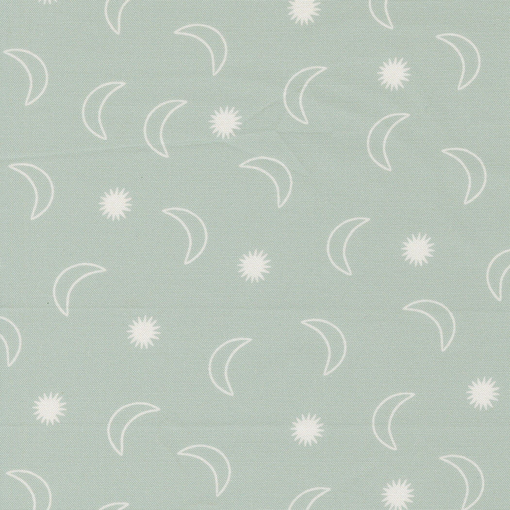fabric switch with starbursts and crescent moon outlines in soft white on a soft sage green background