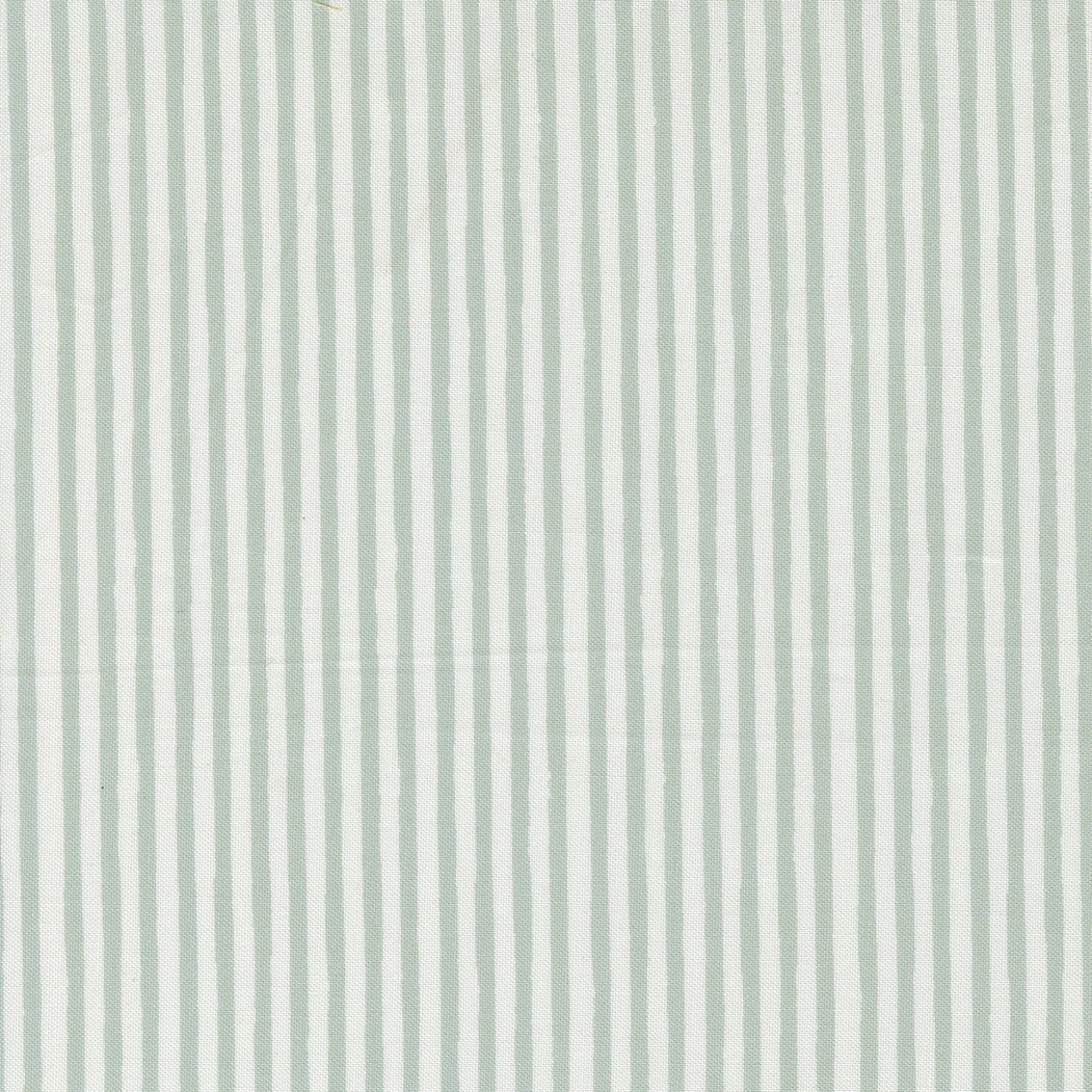 fabric swatch of thin vertical stripes alternating soft white and soft sage green