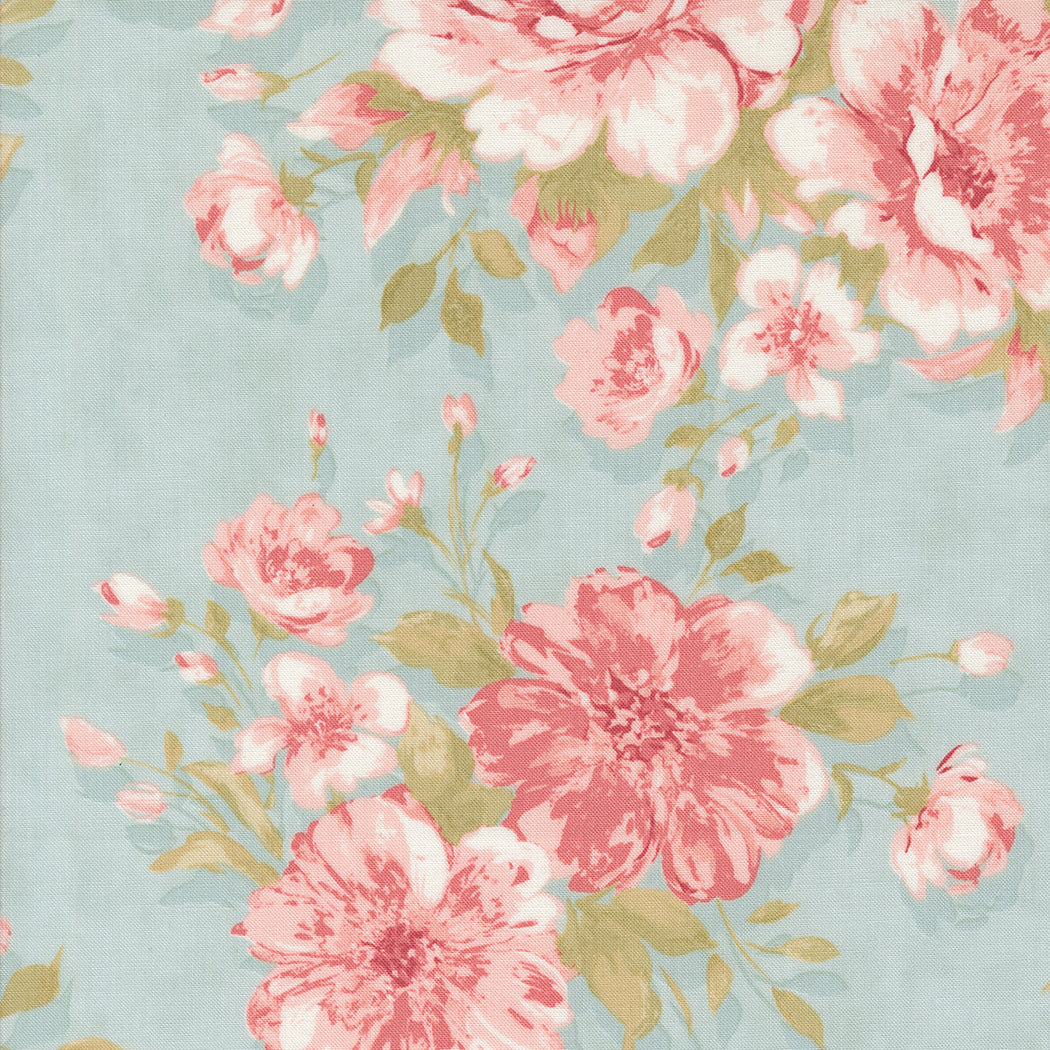 fabric swatch with a print of soft pink roses and greenery on a sky blue background