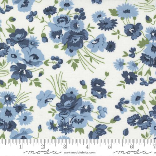 Cream fabric with blue and green flowers
