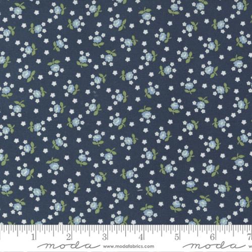 Navy fabric with light blue flowers and green leaves
