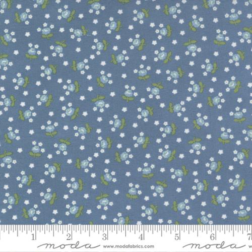 Light blue fabric with blue fabrics and green leaves