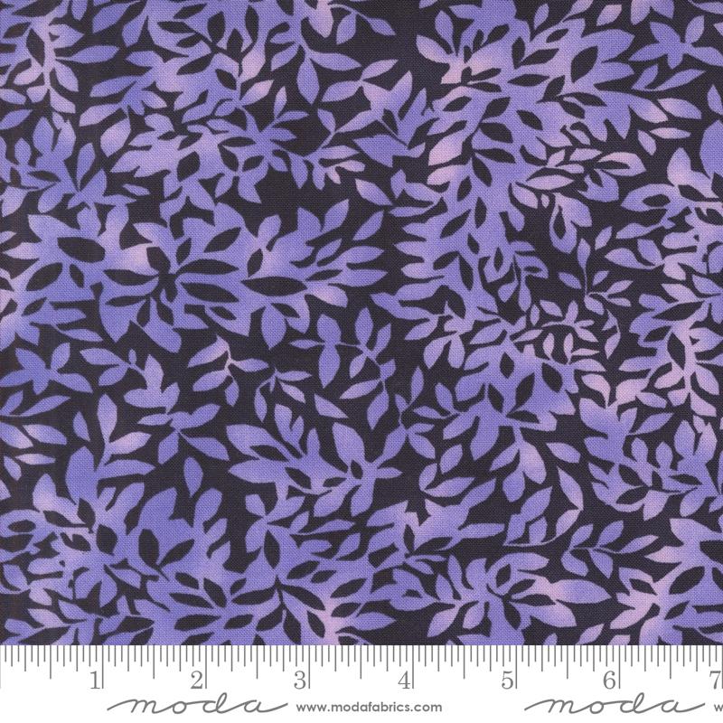 Purple leafy pattern with a dark purple background