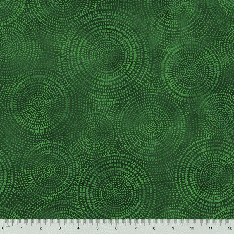 fabric swatch featuring circles within circles made up of small light green marks all on a pine green background