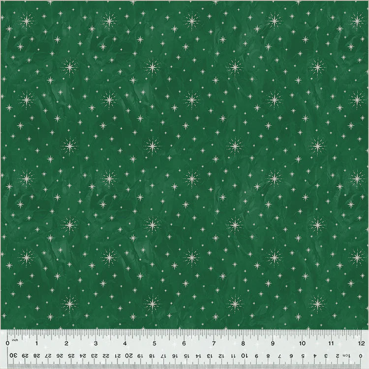fabric swatch of white twinkle stars in various sizes in a geometric pattern on a green background