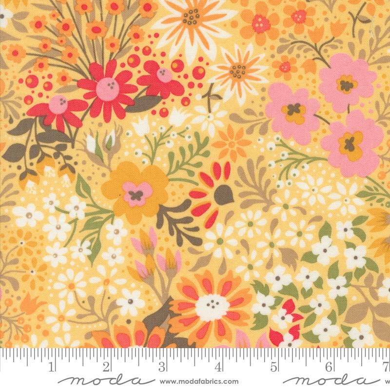 Yellow background with colorful spring flowers
