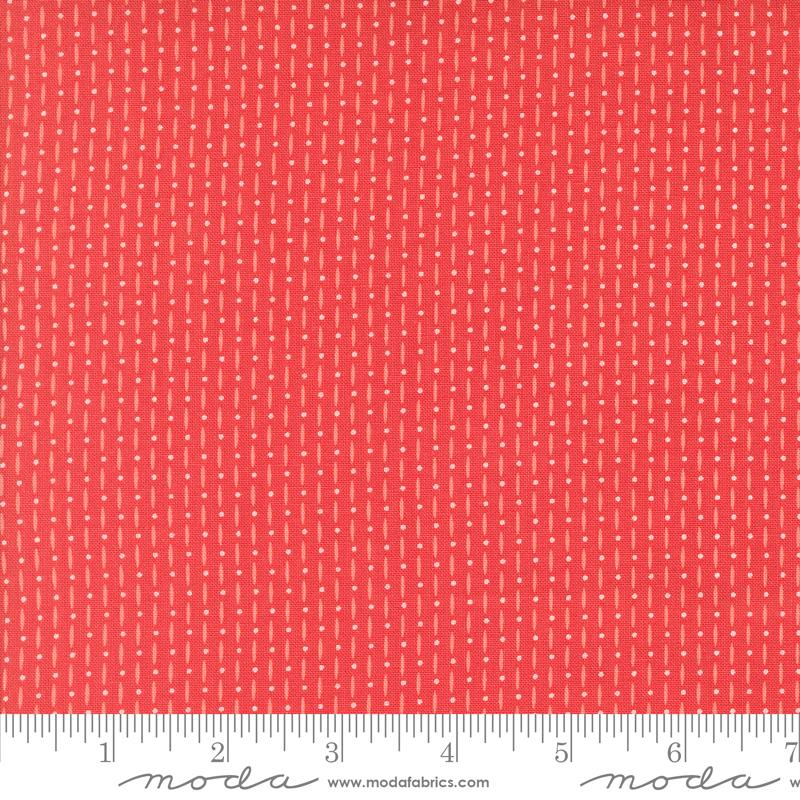 Red fabric with lines and dots