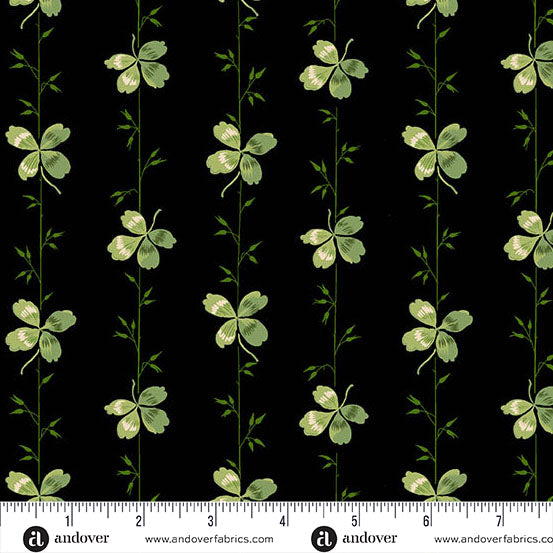 Black fabric with 4 leaf clovers in a stripe