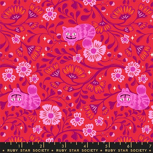 purple vines with pink and orange florals on a red background with the pink Cheshire cat featured through out