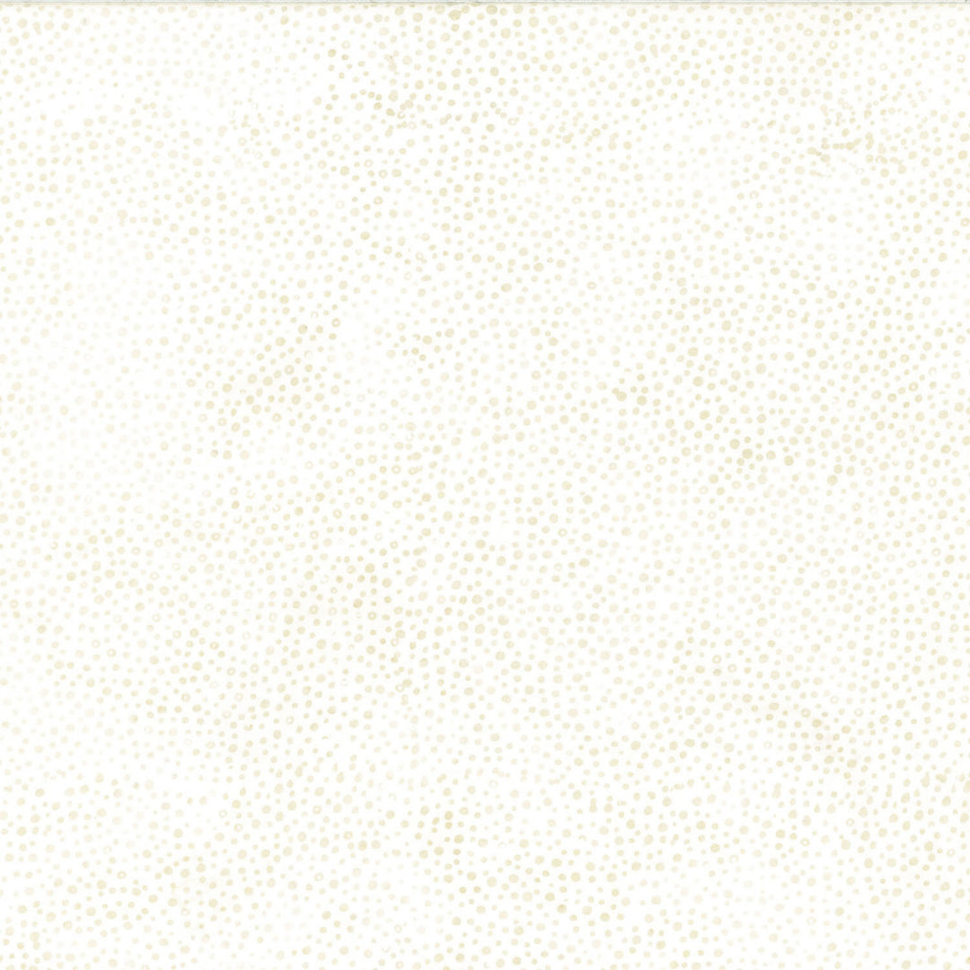 Cream colored batik fabric with darker cream dots