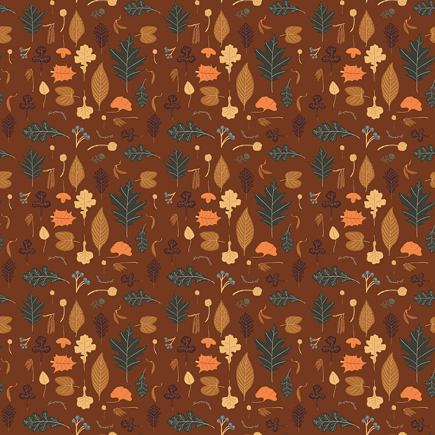 Brown fabric with assortment of fall colored leaves