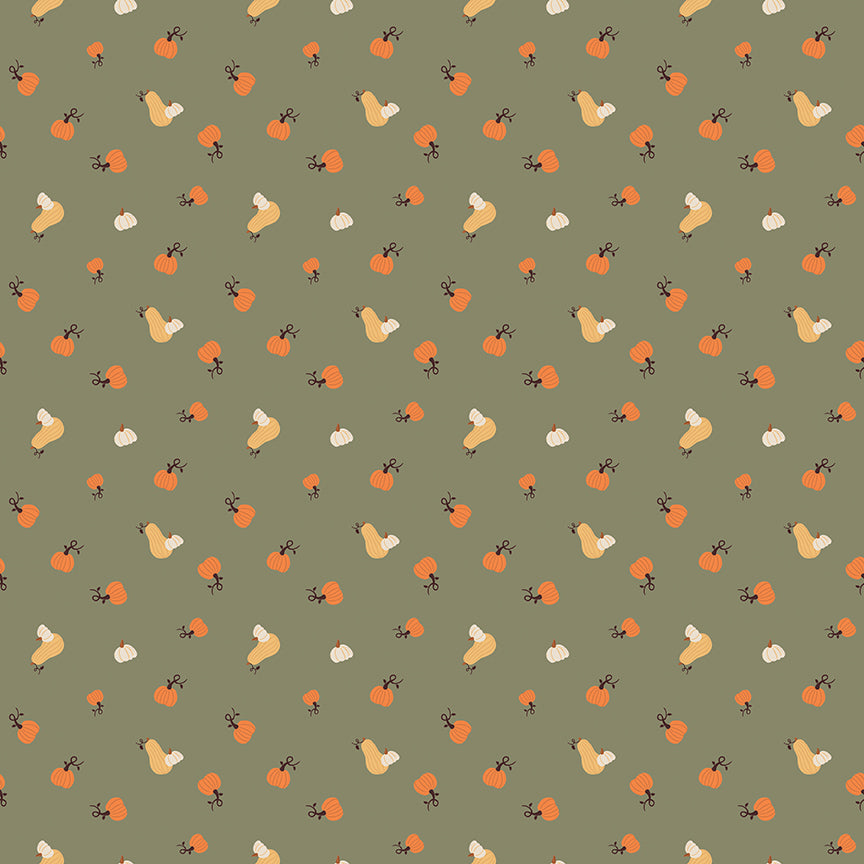 Green fabric with small assortment of pumpkins
