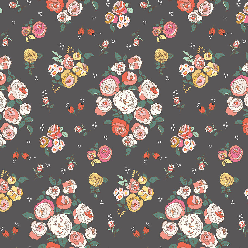 Dark grey background with a small colorful floral design
