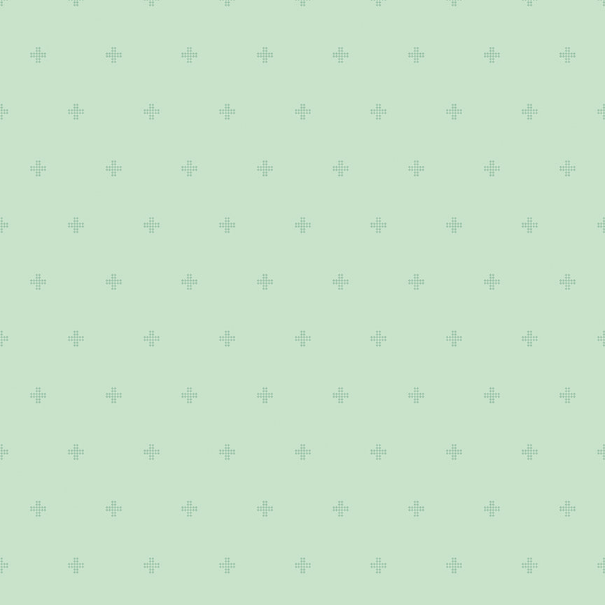 Mint background with small crosses stitched. Tone on tone