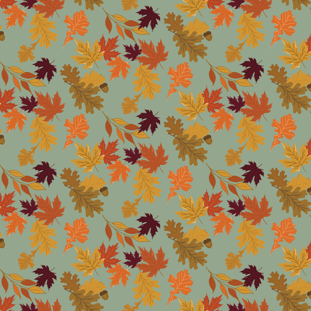 Pattern of autumn leaves on a green background