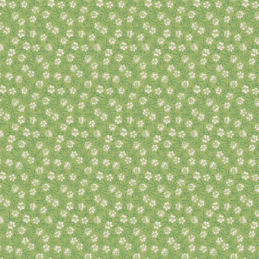 This print features blossoms and bows in green