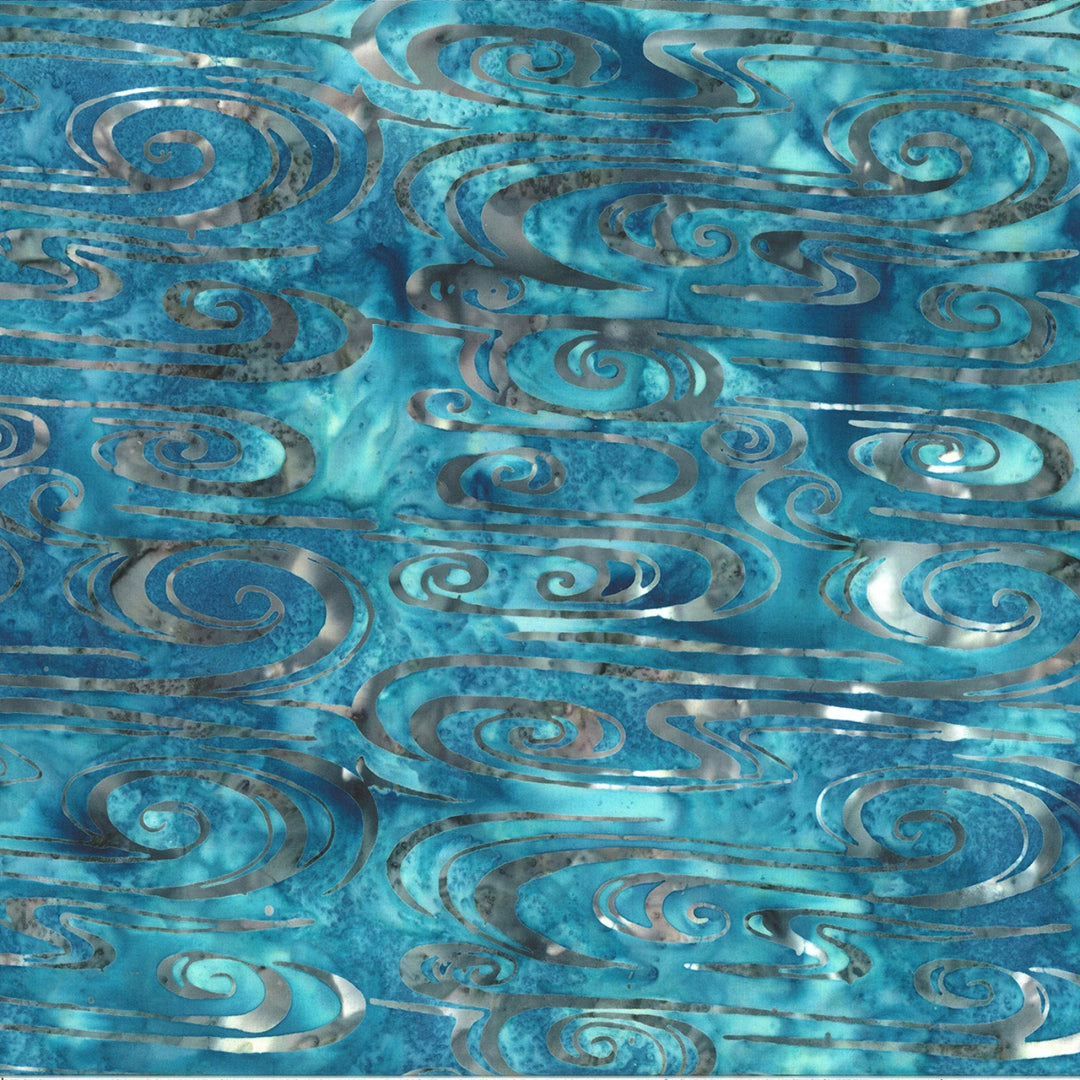 Blue fabric with silver metallic swirl pattern