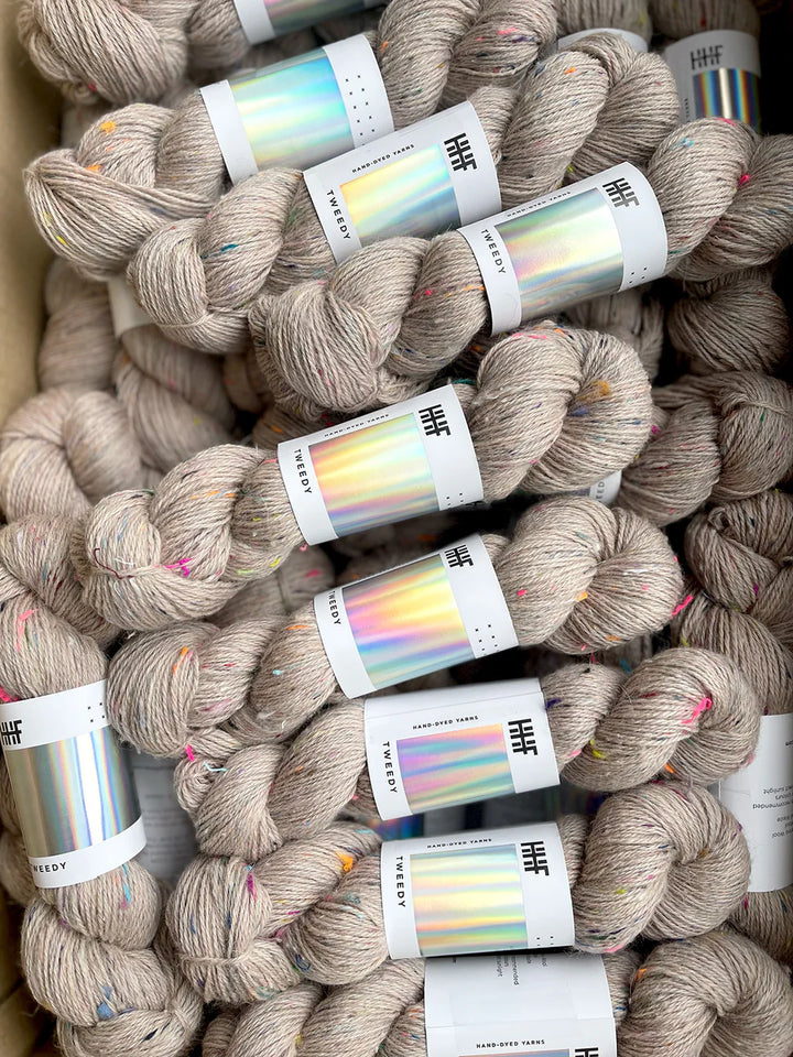 Light Tan Tweedy yarn with pink, orange, green, and purple