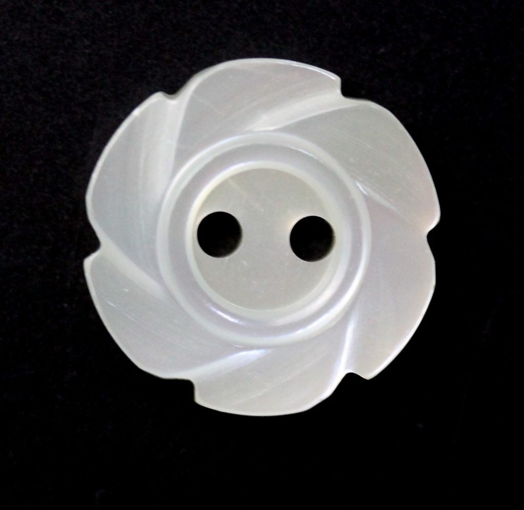 A white, snail-shaped swirl button on a dark background.