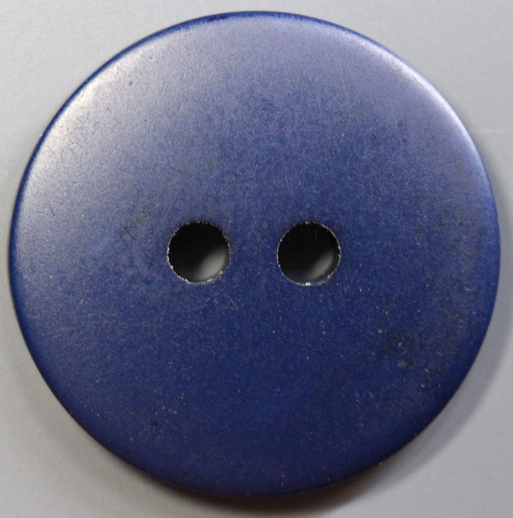 A two-hole navy blue polyester button, size 30L, on a white background
