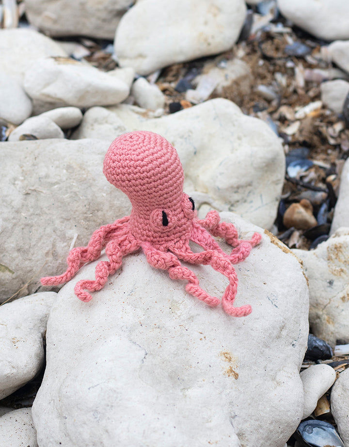 Orla the Pink Octopus is a stuffed crochet animal
