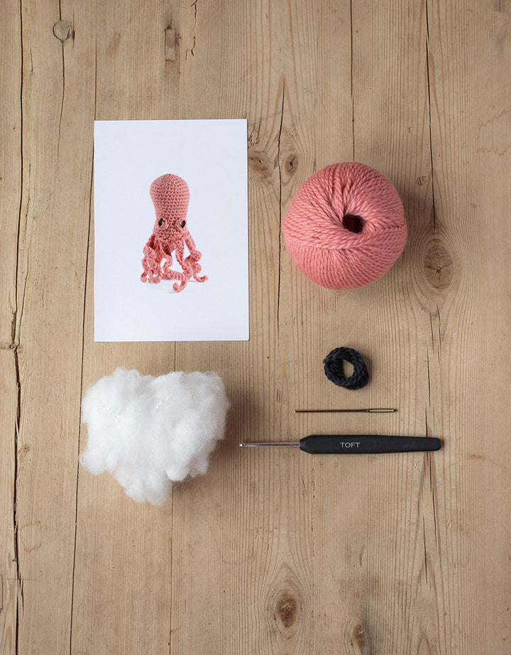 Orla the Octopus kit includes yarn, stuffing, needle, and crochet hook