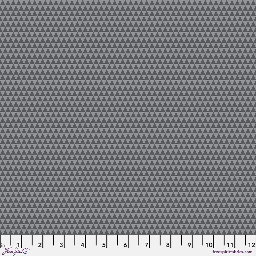 fabric swatch of tiny geometric triangles in alternating light and dark gray