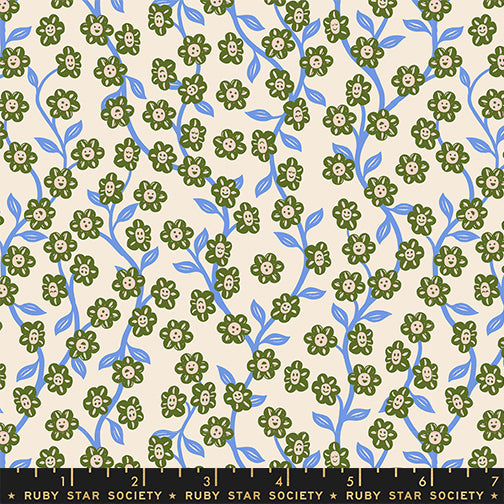 floral daisy vine print with smiley faces on each flower, flowers are green and white and vines are light blue, all on an off white background