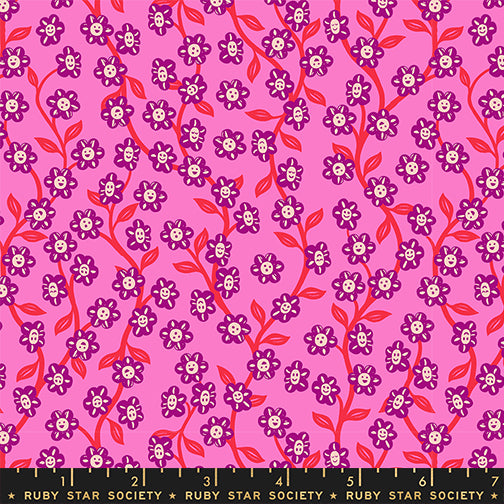 floral daisy vine print with smiley faces on each flower, flowers are purple and white and vines are dark pink, all on a pink background background