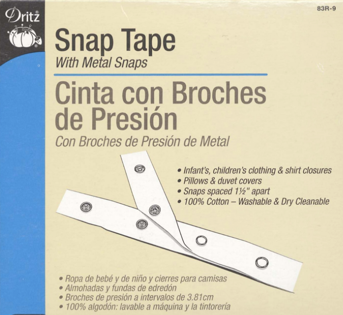 Packaging for Dritz Cotton Snap Tape with metal snaps, primarily white in color with text and diagram illustrating the product use.
