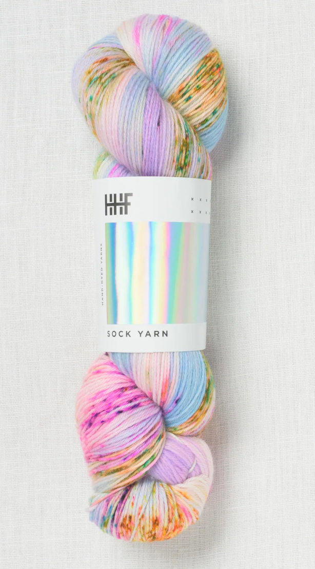 Sock yarn with pink, blue, purple, and green