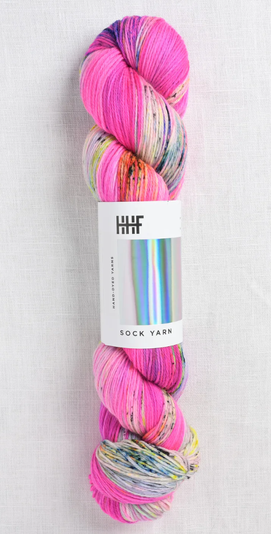 Sock yarn. Pink with hints of blue, yellow, and green