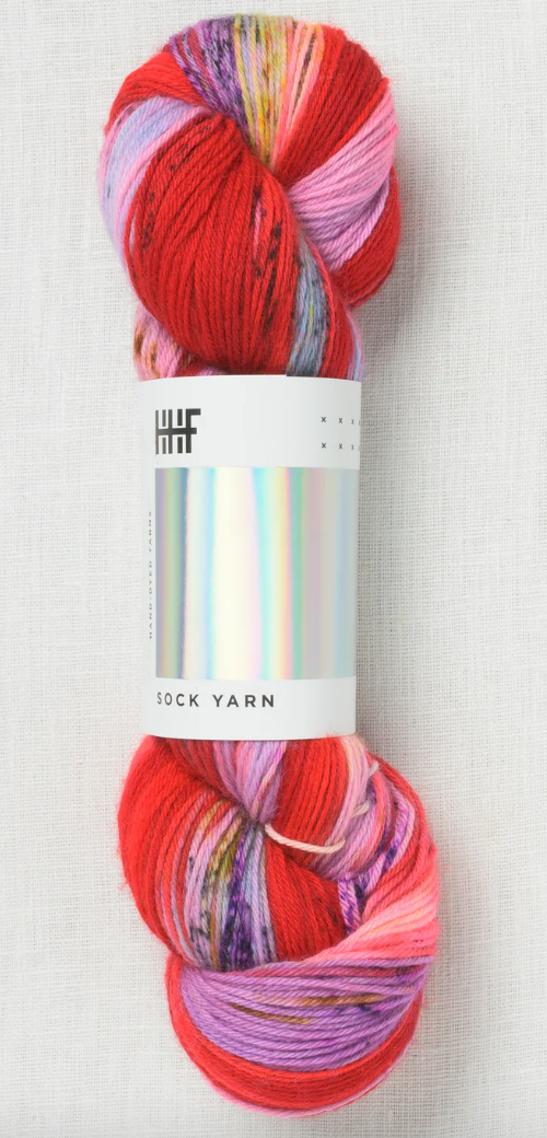 Sock yarn with red, purple, pink, and yellow