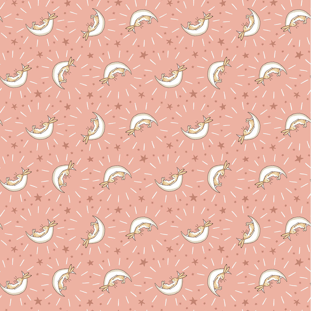Coral fabric with white half moons with bunnies sitting on them