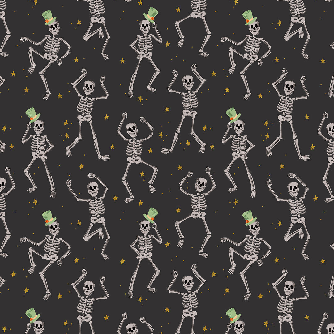 Black fabric with dancing skeletons that are wearing a top hat. Metallic gold stars in the background