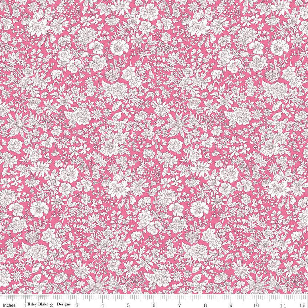 Pink background with white floral design