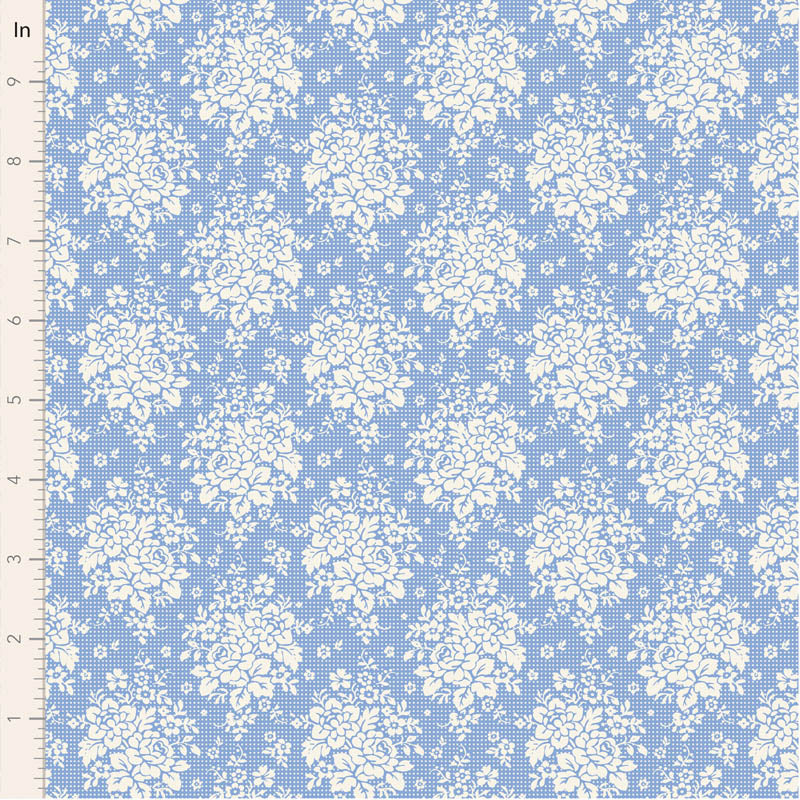White floral pattern on a blue fabric background