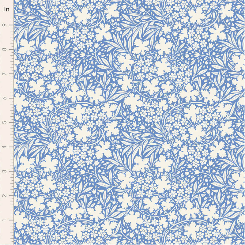 Floral patterned fabric with white flowers on a blue background, measured in inches.