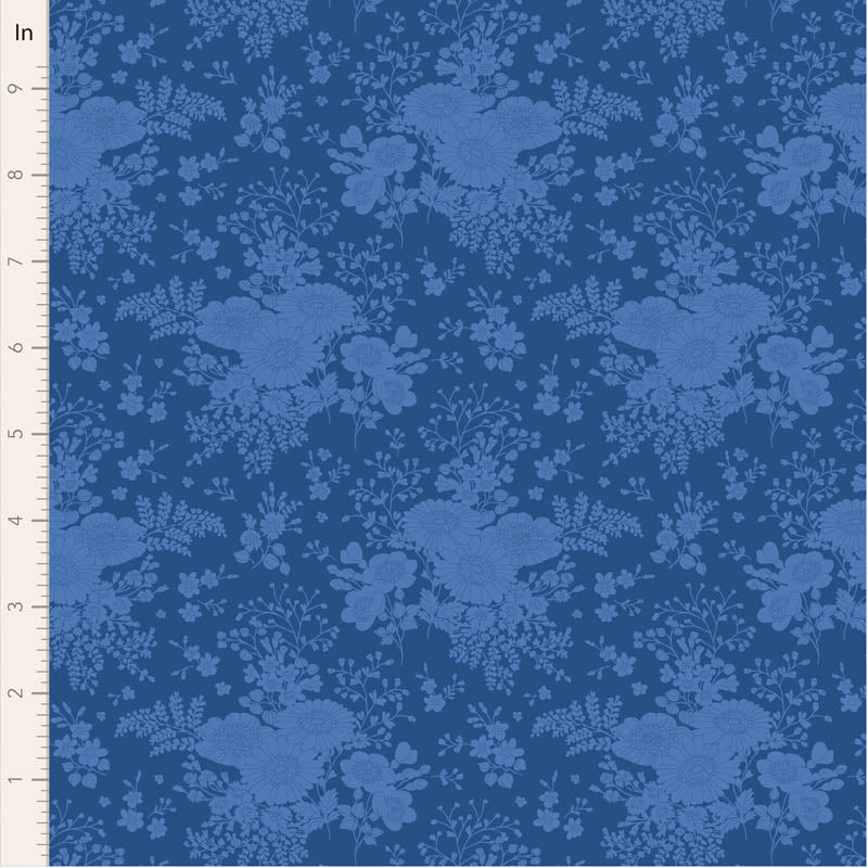 Blue floral patterned fabric with a ruler on the side