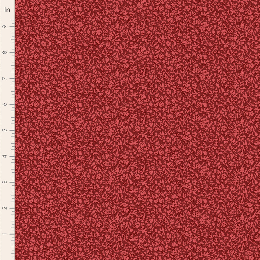 Red fabric with a subtle pattern on a scale ruler background