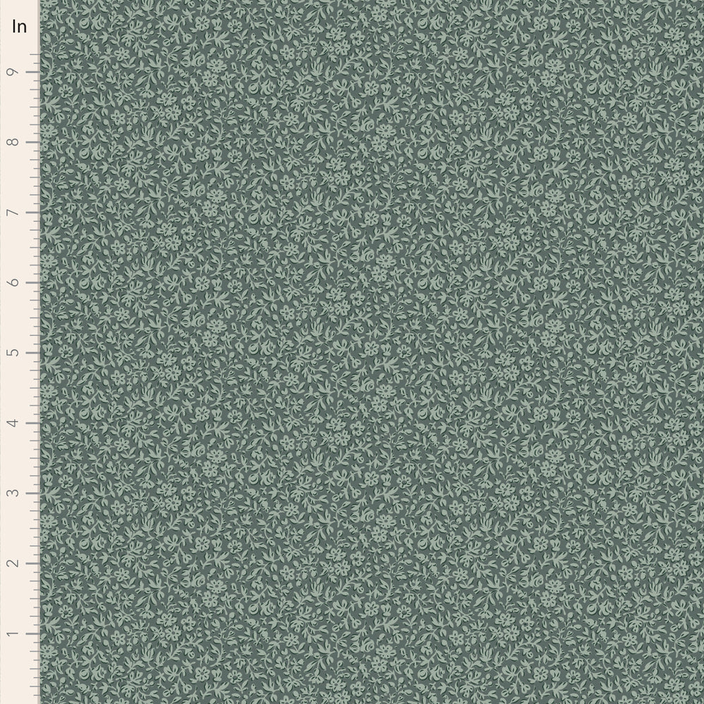 Green fabric with a subtle pattern on a green background