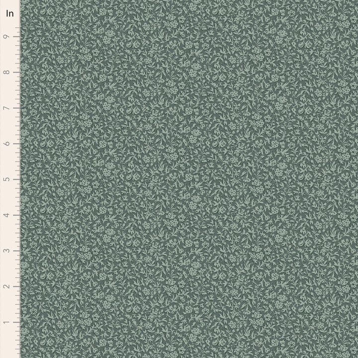 Green fabric with a subtle pattern on a green background