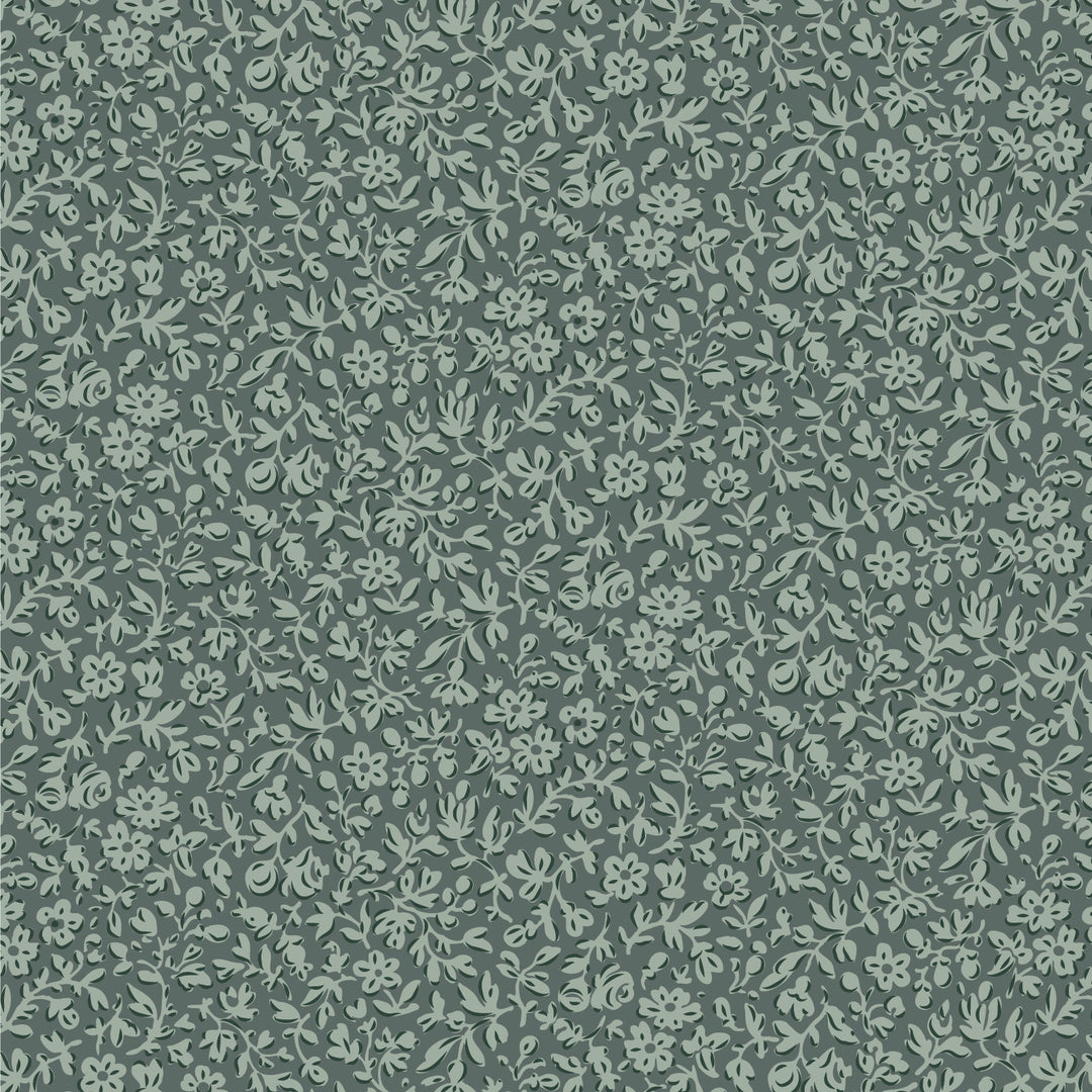 Patterned fabric with small floral designs on a dark green background