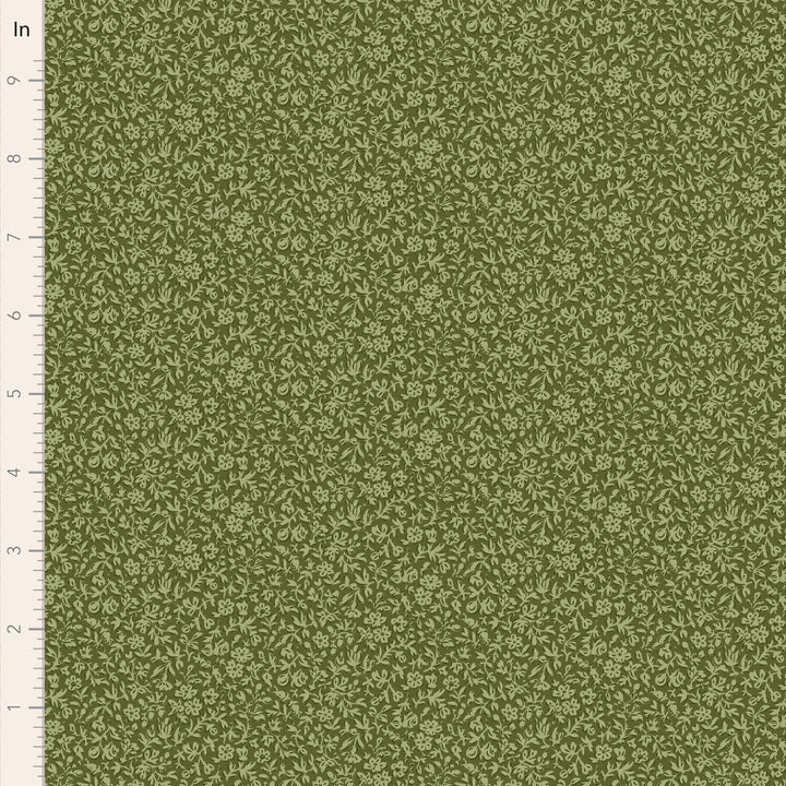 Green fabric with a subtle pattern on a green background