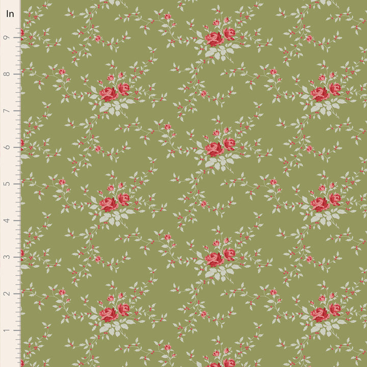Floral pattern with red roses and green leaves on a green background, measured against a ruler.
