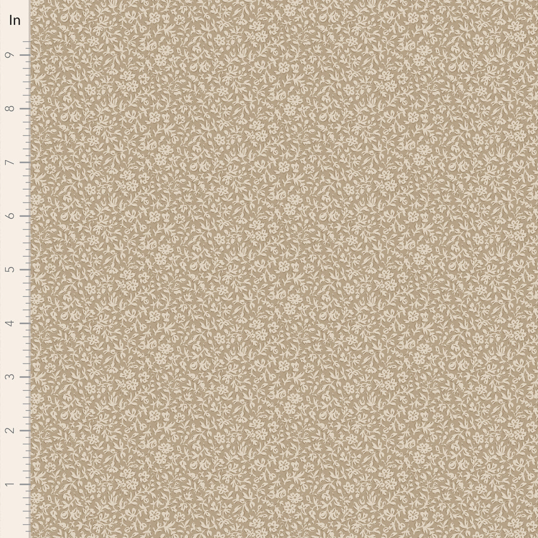 Beige fabric with a subtle floral pattern on a beige background