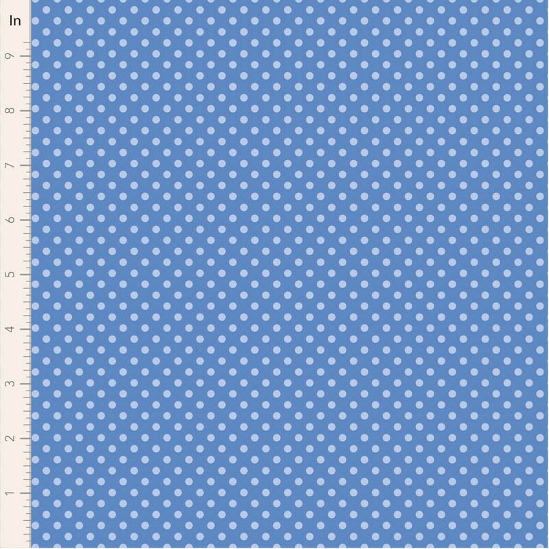 Blue fabric with white polka dots and a ruler on the side